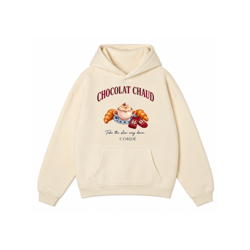CORDÉ Cream hoodie, front: Chocolat Chaud lettering, hot chocolate and croissants.