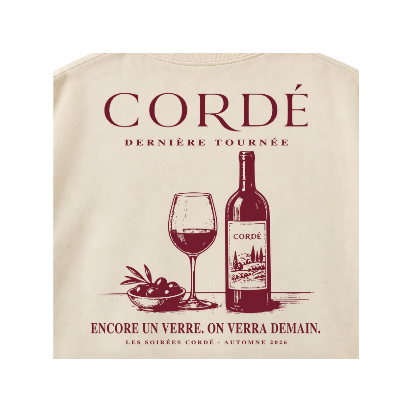 CORDÉ Cream longsleeve, back detail: wine bottle, wine glass and bowl of olives.