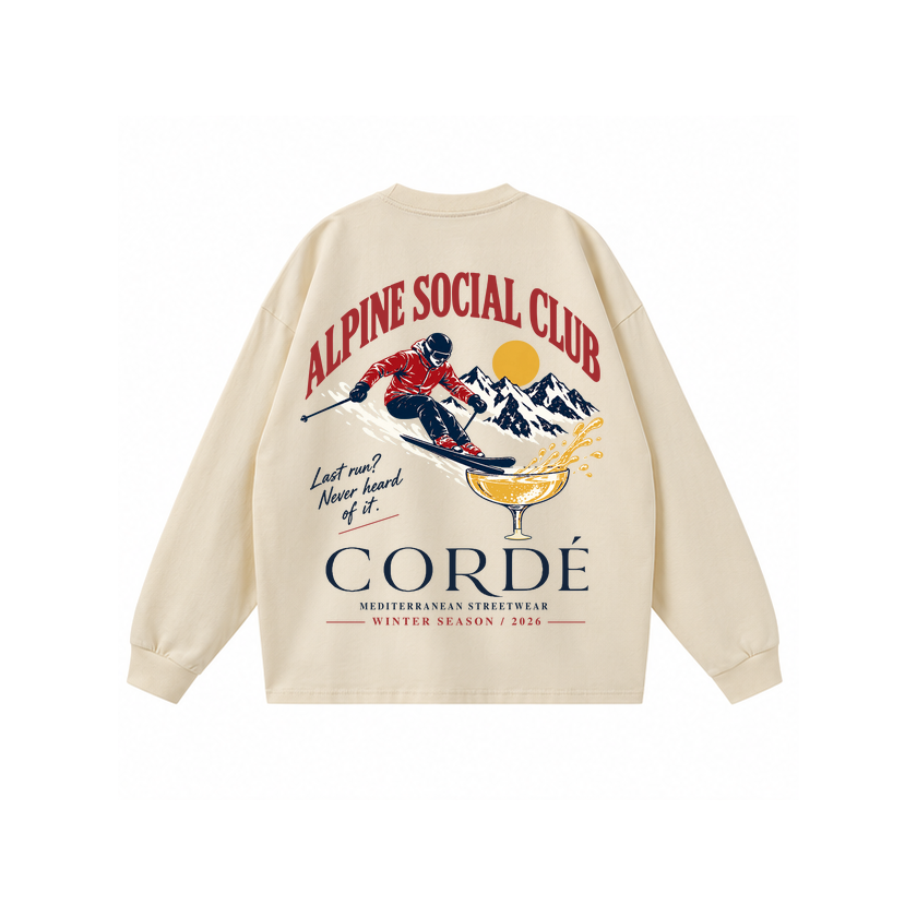 CORDÉ Cream longsleeve, back: Alpine Social Club skier and champagne illustration.