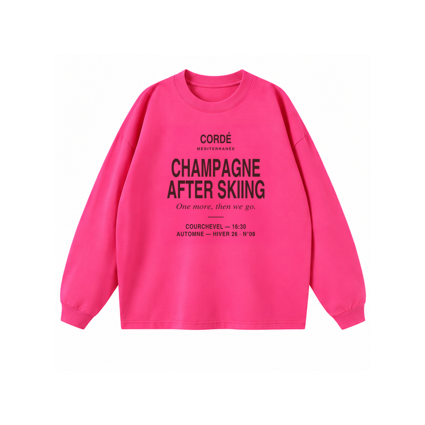 CORDÉ Hot Pink longsleeve, front: Champagne After Skiing lettering.