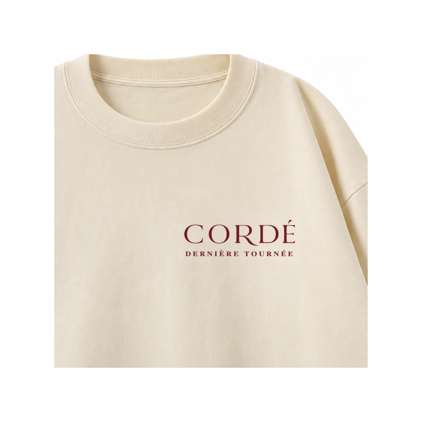 CORDÉ Cream longsleeve, front detail: small CORDÉ Dernière Tournée signature.