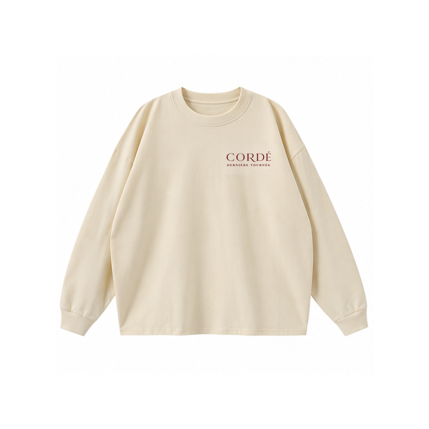 CORDÉ Cream longsleeve, front: small CORDÉ Dernière Tournée signature.